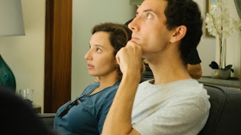 Man Sitting Beside Woman