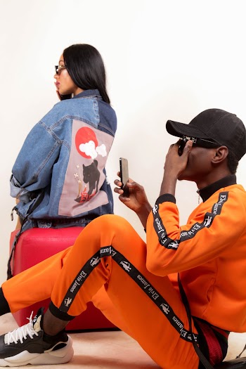 Man Sitting Beside Woman Wearing Denim Jacket
