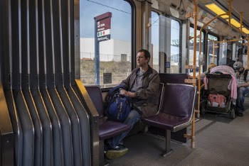 Man Sitting in Vehicle