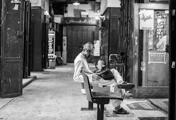 Man Sitting Indoors