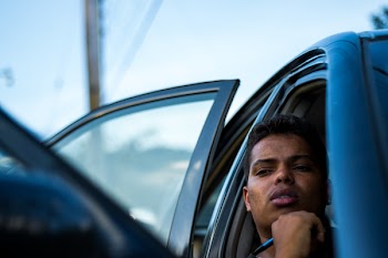 Man Sitting Inside Car