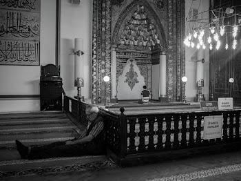 Man Sitting Near Altar