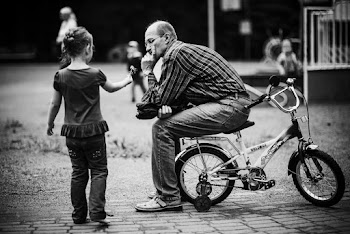 Man Sitting on a Bike