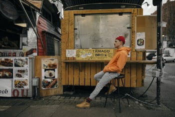 Man Sitting on Barstool