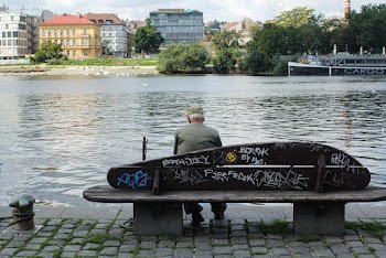 Man Sitting on Bench