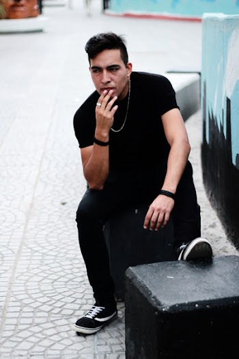 Man Sitting on Bench
