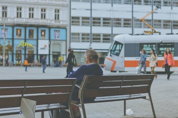 Man Sitting on Bench