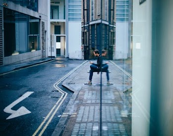 man sitting on bench