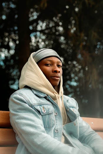 Man Sitting on Bench