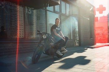 Man Sitting on Black Motorcycle