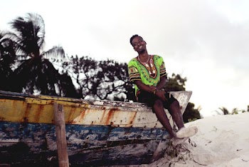 Man Sitting On Boat