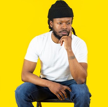 Man Sitting on Chair