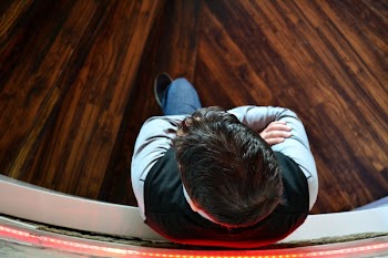 Man Sitting on Chair