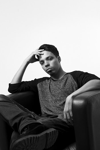 Man Sitting on Chair