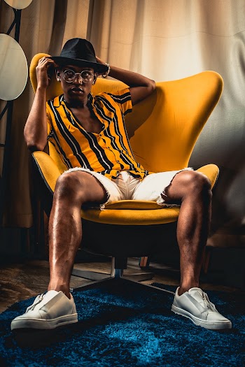 Man Sitting On Chair