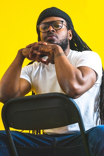Man Sitting on Chair
