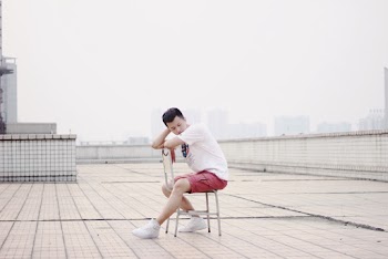 Man Sitting On Chair