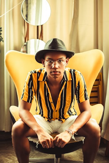 Man Sitting On Chair