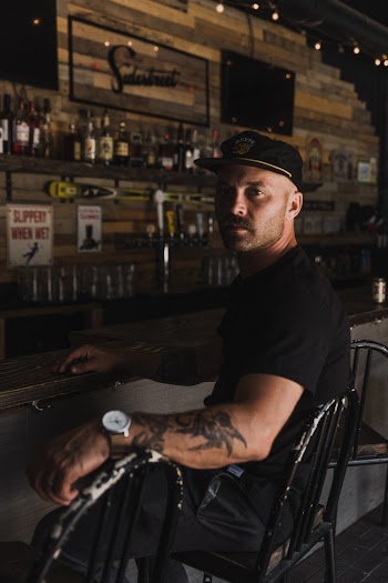 Man Sitting on Chair