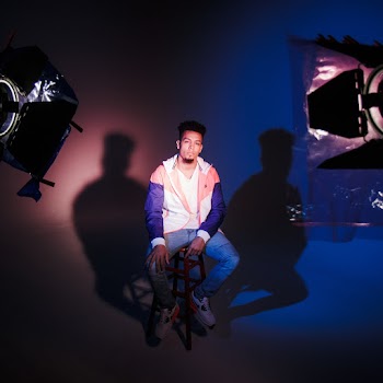 Man Sitting on Chair