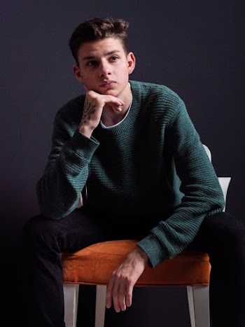 Man Sitting On Chair