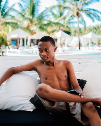 Man Sitting on Chair