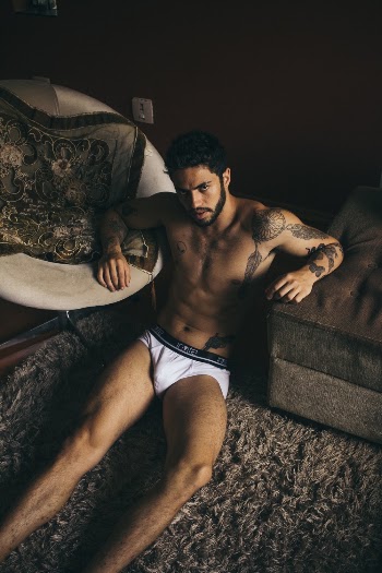 Man Sitting On Floor