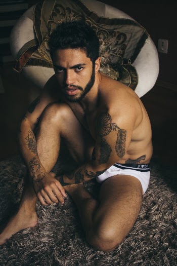 Man Sitting on Gray Carpet