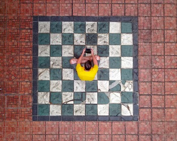 Man Sitting On Ground
