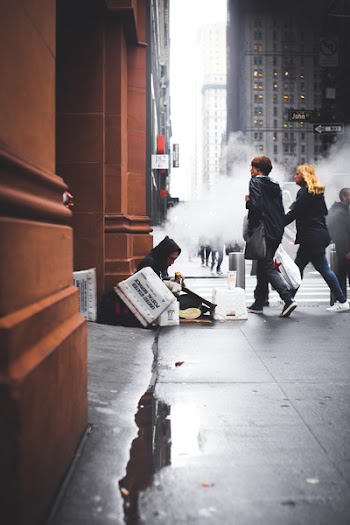 Man Sitting on Ground