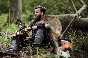 Man Sitting on Ground