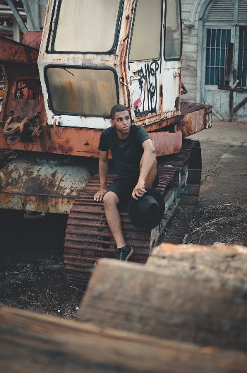 Man Sitting on Heavy Equipment