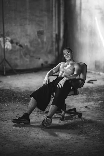Man Sitting On Office Chair