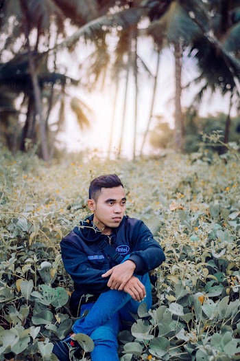 Man Sitting on Plants Outdoor