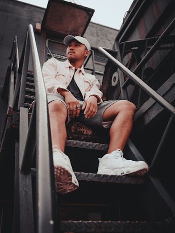 man sitting on stair