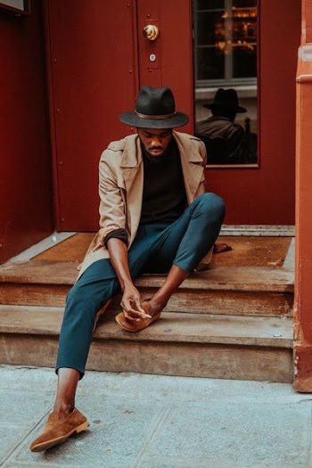 man sitting on staircase