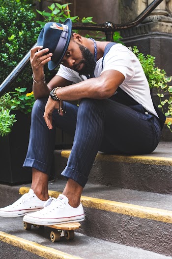 Man Sitting on Stairs