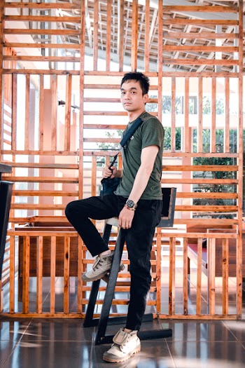 Man Sitting on Stool