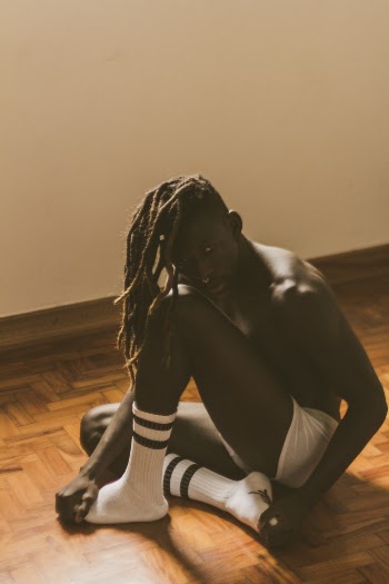 Man Sitting on the Floor