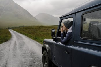 Man Sitting on Vehicle