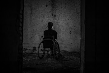 Man Sitting on Wheelchair