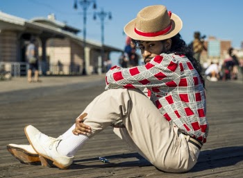 Man Sitting on Wooden Planks