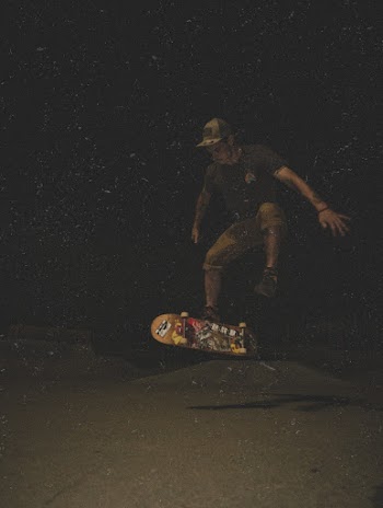 Man Skating At Nighttime