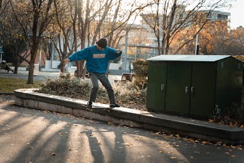 Man Skating Doing Tricks 