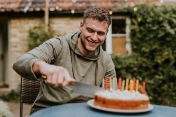 Man slicing a piece of cake | Free Photo - rawpixel