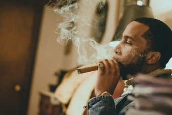 Man Smoking Cigar 