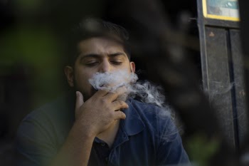 Man Smoking Cigarette