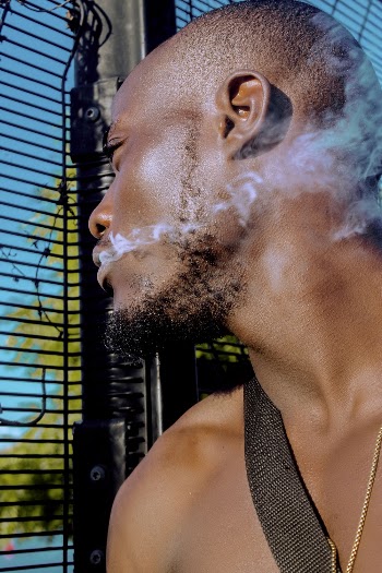 Man Smoking On Focus Photography