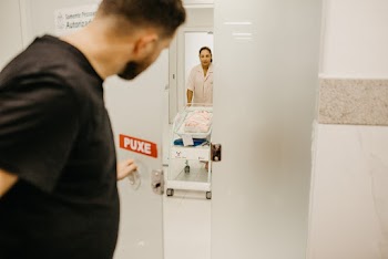 Man Standing at the Door
