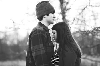 Man Standing at the Front of Woman